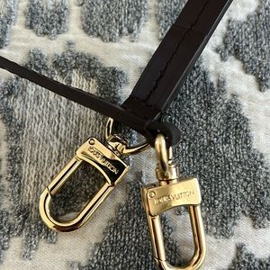 Louis Vuitton Crossbody Bag with Gold and Black Accents